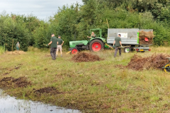 Verzamelen en afvoeren van het maaisel 